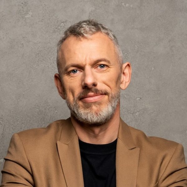 bearded-businessman-standing-with-crossed-arms-and-ZK5V8XY